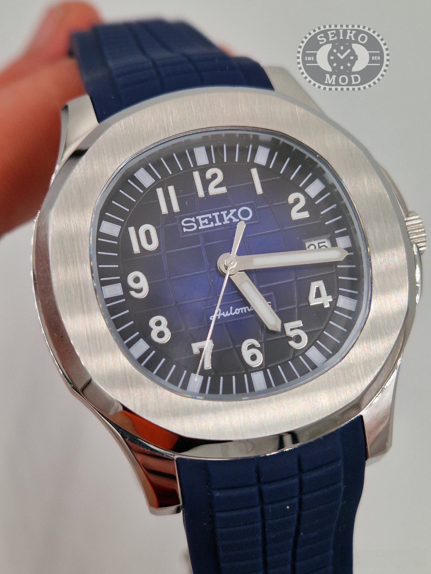 Aquanaut mod med blåt sportband